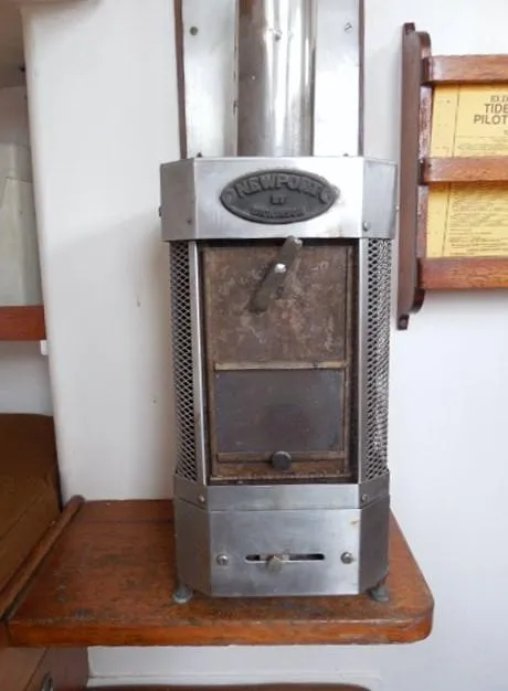 Slide: The Image of Vintage Newport stove on 1961 Rhodes Swiftsure boat interior. - 30