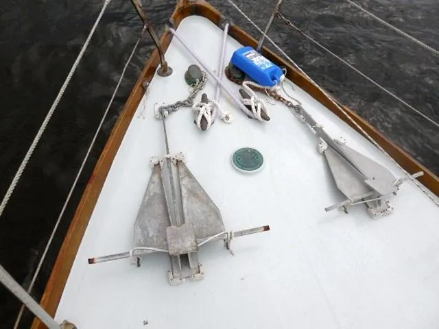 Slide: The Image of Deck of 1961 Rhodes Swiftsure sailboat with anchors and ropes. - 47