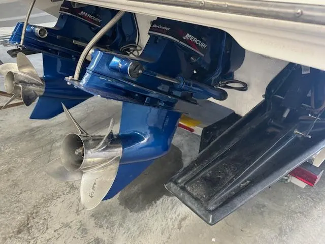 Slide: The Image of Close-up of 2004 Fountain 35 Executioner boat's twin Mercury outboard engines. - 10