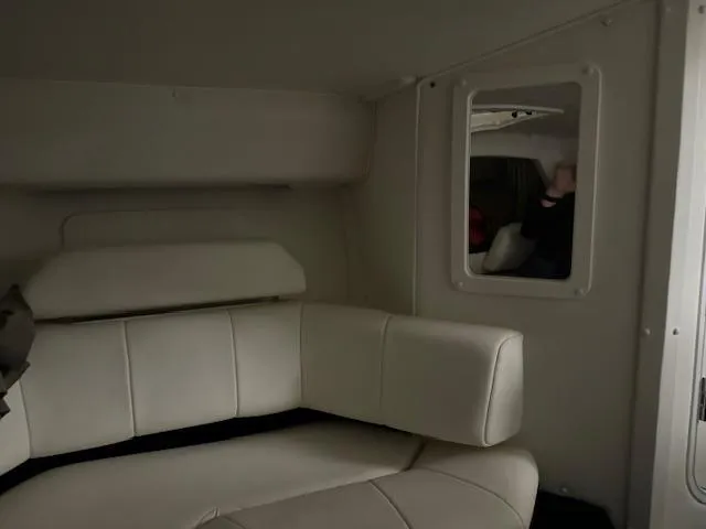 Slide: The Image of Interior of a 2004 Fountain 35 Executioner boat with white leather seating. - 12