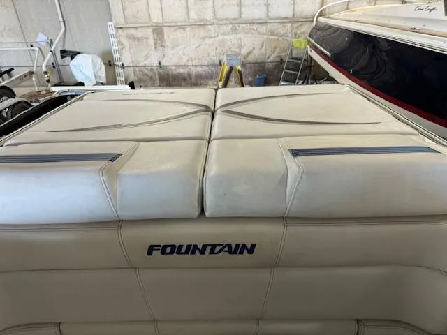 Slide: The Image of 2004 Fountain 35 Executioner boat interior with logo in a storage area. - 18