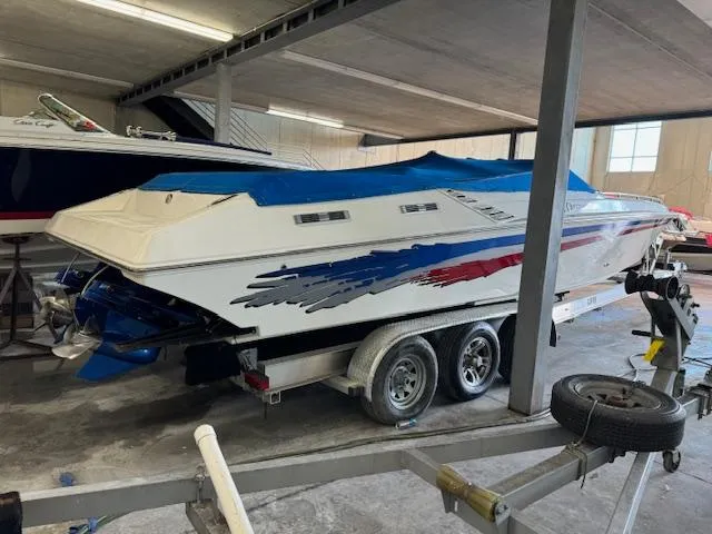 Slide: The Image of 2004 Fountain 35 Executioner speedboat on a trailer in a storage facility. - 3