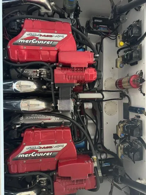 Slide: The Image of 2004 Fountain 35 Executioner boat with twin MerCruiser engines in engine compartment. - 6