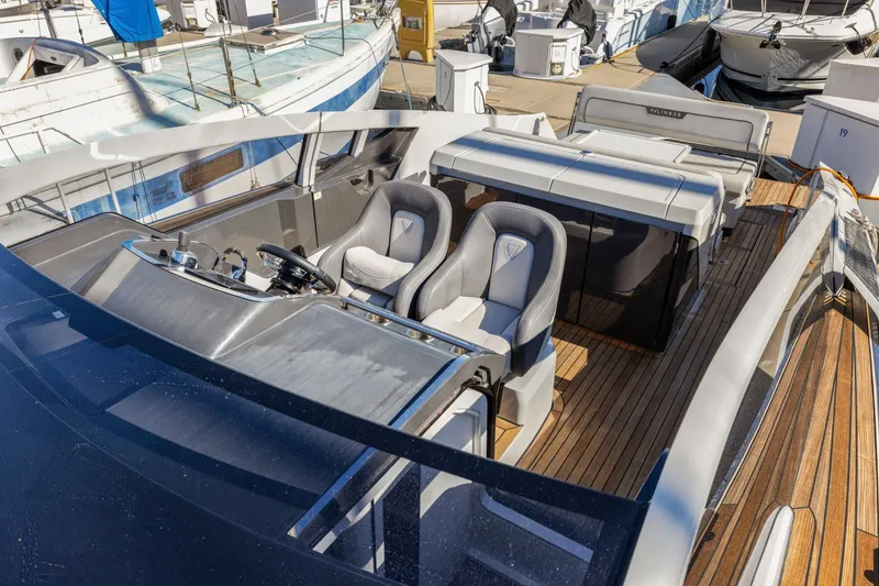 Slide: The Image of 2021 Fairline Fline 33 yacht interior with sleek design and modern seating. - 37