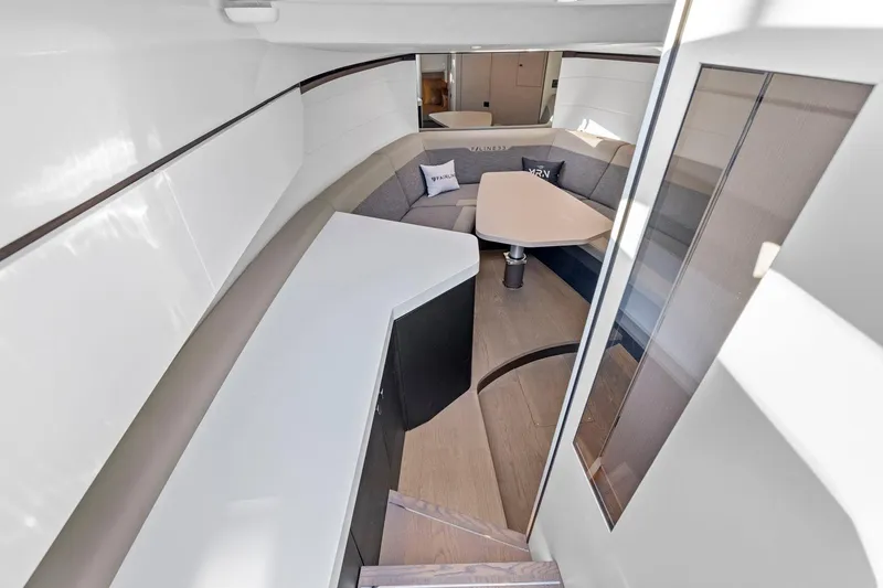 Slide: The Image of Interior of 2021 Fairline Fline 33 yacht, featuring modern seating and sleek design. - 41