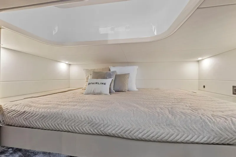 Slide: The Image of Luxurious cabin interior of 2021 Fairline Fline 33 yacht with cozy bedding. - 44