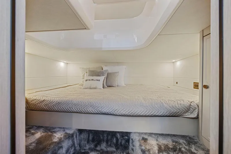 Slide: The Image of Luxurious cabin interior of 2021 Fairline Fline 33 yacht with cozy bedding. - 45