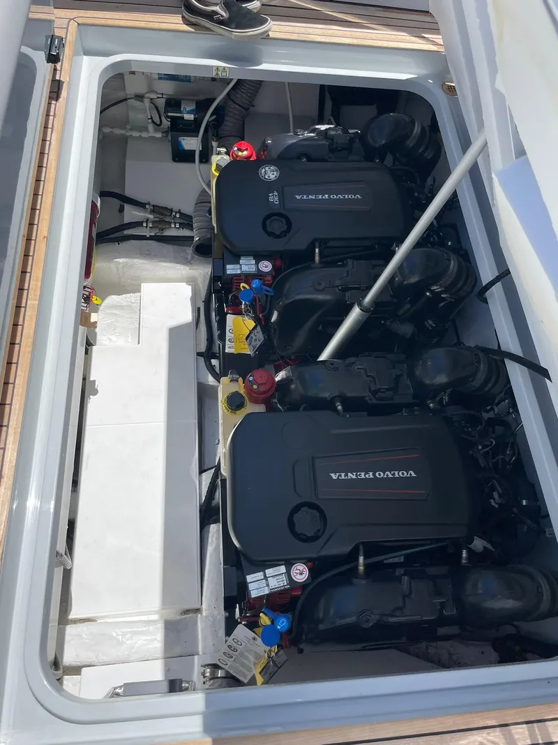 Slide: The Image of 2021 Fairline Fline 33 engine compartment with twin Volvo Penta engines. - 48