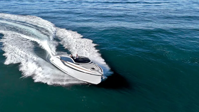 Slide: The Image of 2021 Fairline Fline 33 yacht cruising on open sea. - 5