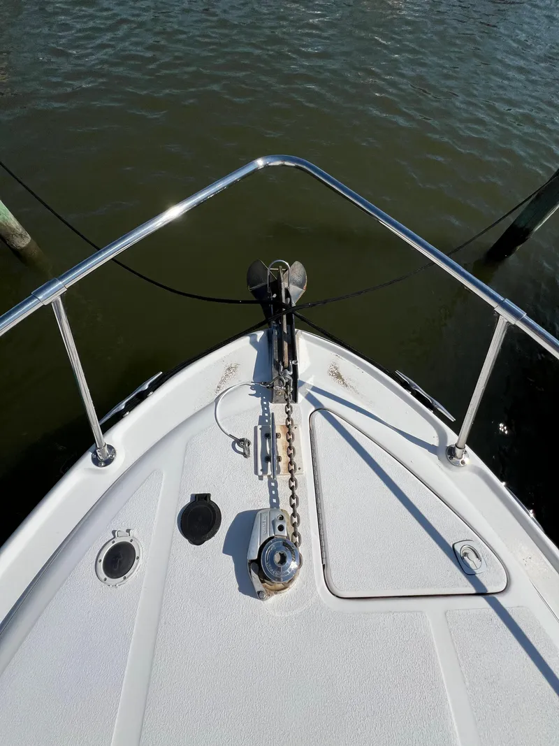 Slide: The Image of Bow of a 2001 Sea Ray 270 Sundancer with anchor and chain. - 27