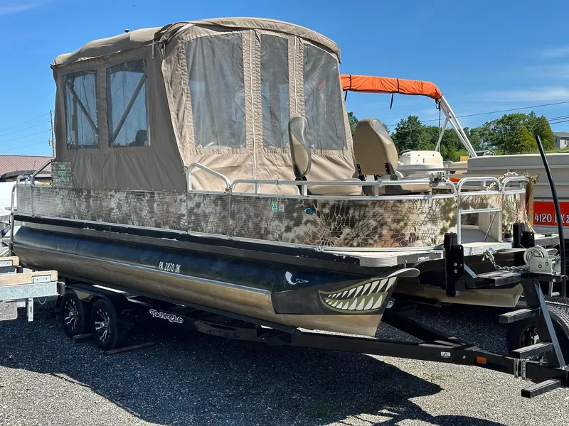 Slide: The Image of 2008 Avalon 2225 Fish pontoon boat with 2019 Evinrude 115 engine and 2020 trailer. - 12