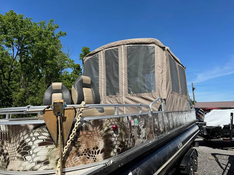 Slide: The Image of 2008 Avalon 2225 Fish pontoon boat with 2019 Evinrude 115 engine and 2020 trailer. - 13