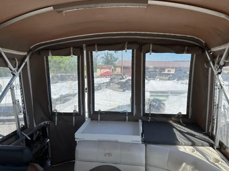 Slide: The Image of Interior of 2008 Avalon 2225 Fish pontoon boat with 2019 Evinrude 115 engine and 2020 trailer. - 22