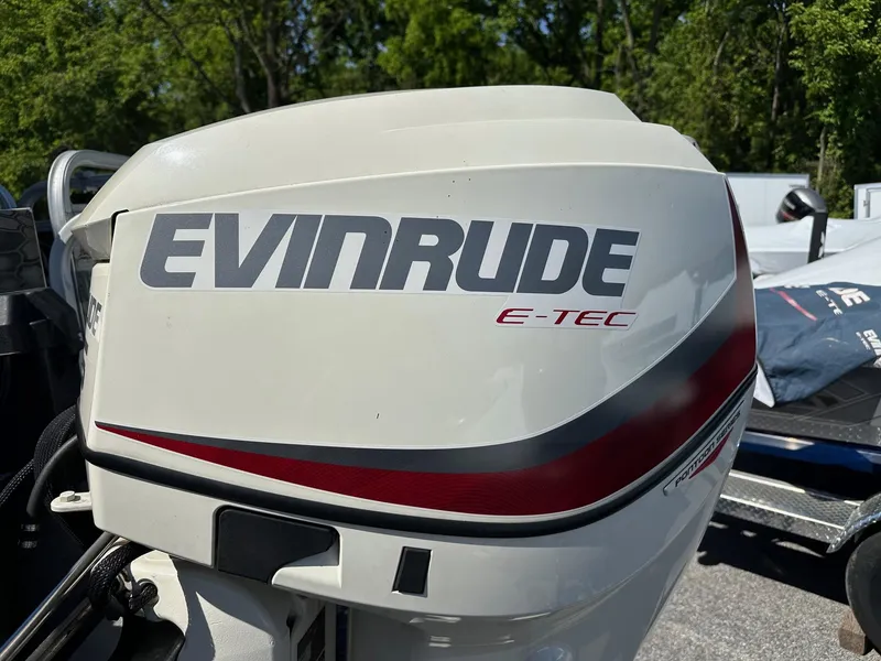 Slide: The Image of Close-up of 2019 Evinrude 115 outboard motor on Avalon 2225 Fish boat. - 9