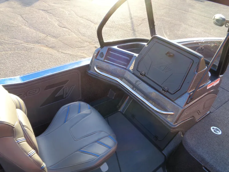 Slide: The Image of 2024 Nitro ZV20 boat interior with seating and storage compartment. - 13
