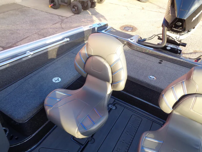 Slide: The Image of 2024 Nitro ZV20 boat interior with cushioned seats and storage compartments. - 15
