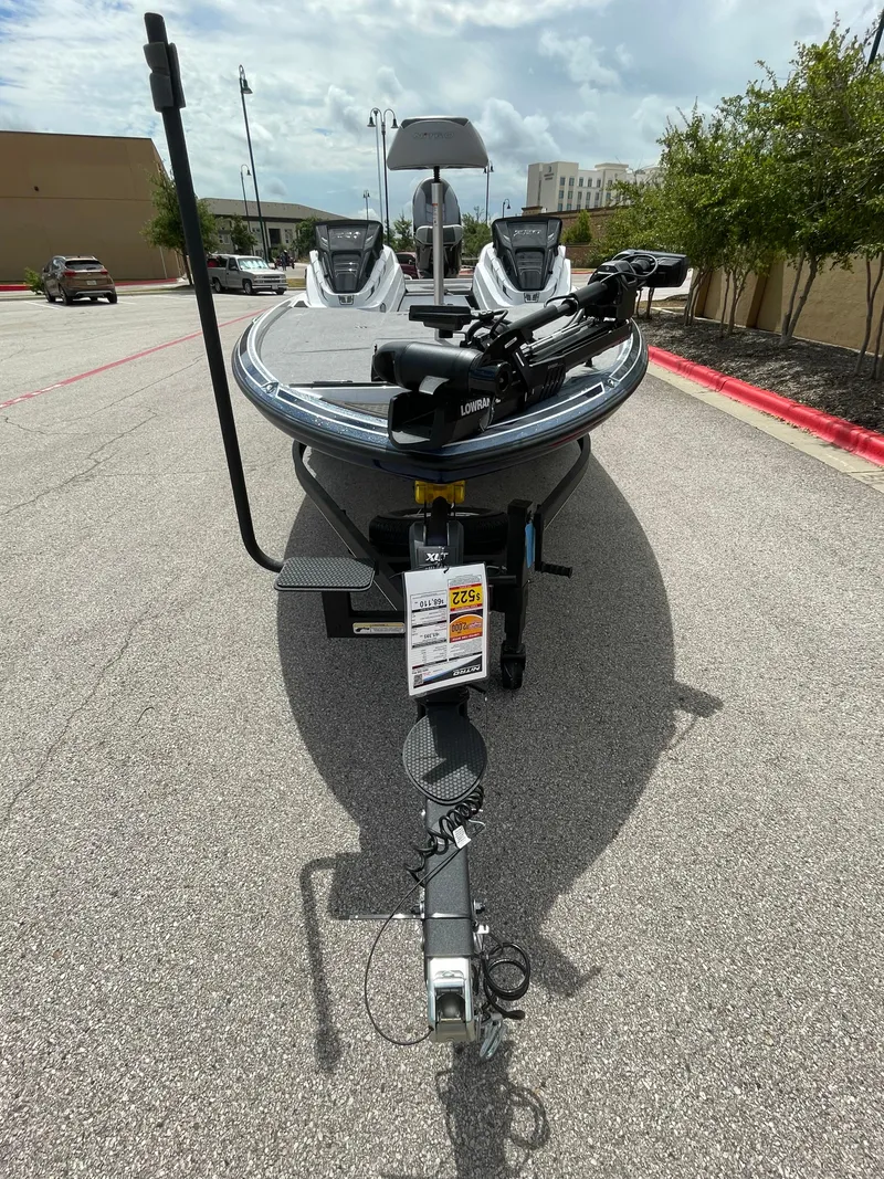 Slide: The Image of 2024 Nitro Z20 Pro boat on trailer in parking lot. - 0