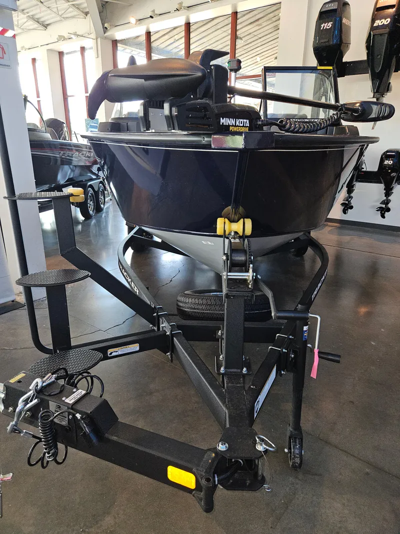 Slide: The Image of 2024 Tracker Targa V-19 Combo boat on trailer in showroom. - 3