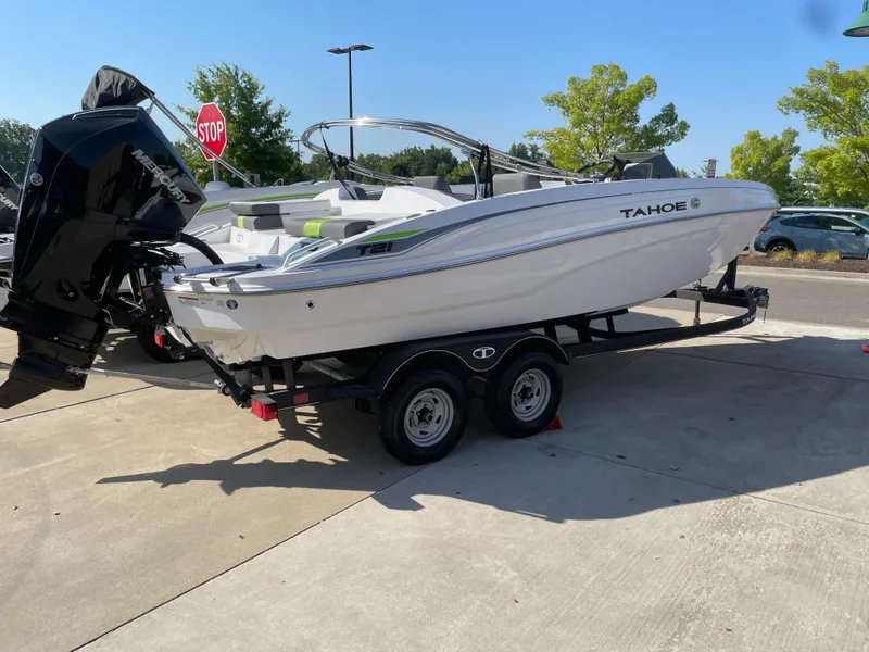 The Image of 2024 Tahoe T21 boat on trailer in outdoor setting. - 0