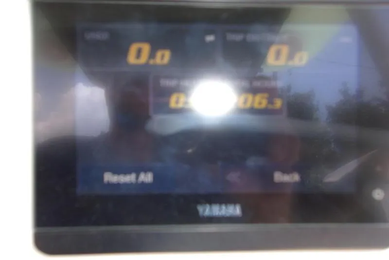 Slide: The Image of 2022 Key West 239FS boat dashboard with Yamaha display screen. - 16