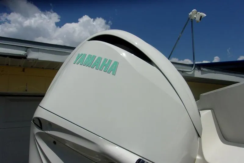 Slide: The Image of Close-up of a Yamaha outboard motor on a 2022 Key West 239FS boat. - 4