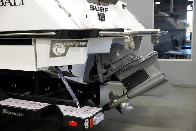 Slide: The Image of 2024 Cobalt R4 Surf boat rear view with Surf Gate technology. - 4