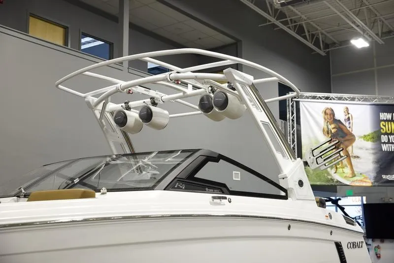 Slide: The Image of 2024 Cobalt R4 Surf boat with sleek design and advanced audio system. - 6