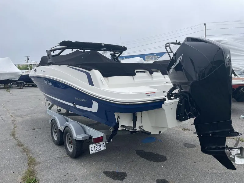 Slide: The Image of 2021 Bayliner VR6 OB boat on a trailer with a Mercury outboard motor. - 4