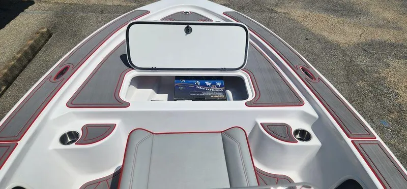 Slide: The Image of 2024 ALK2 Powerboats 17 HS interior with open storage compartment and sleek design. - 10