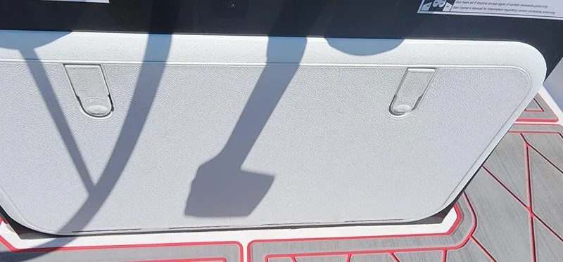 Slide: The Image of 2024 ALK2 Powerboats 17 HS deck with storage compartment and shadow. - 15