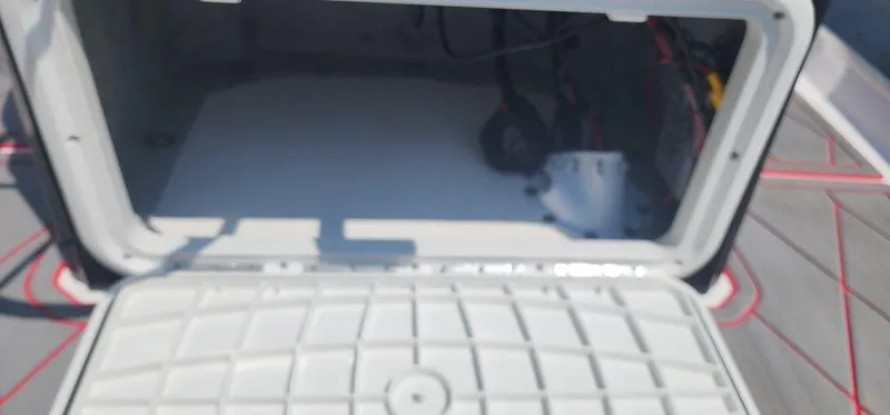 Slide: The Image of Open storage compartment of 2024 ALK2 Powerboats 17 HS model. - 16