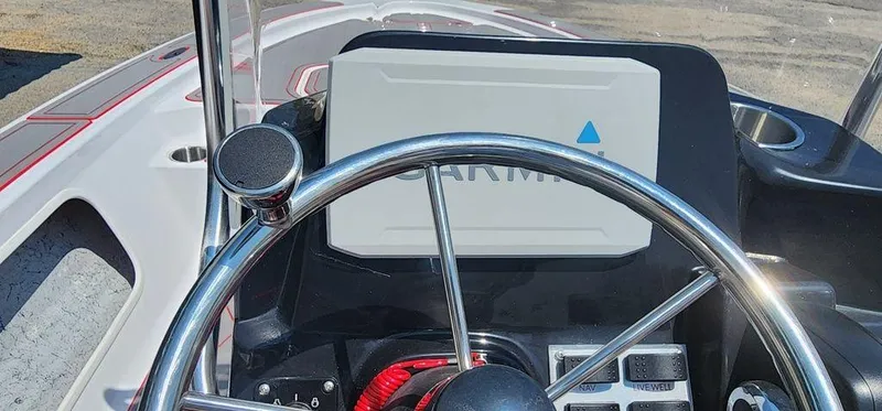 Slide: The Image of Steering wheel of 2024 ALK2 Powerboats 17 HS with navigation system. - 19