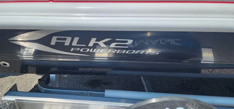 Slide: The Image of 2024 ALK2 Powerboats 17 HS logo on boat hull. - 2