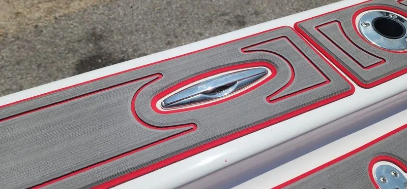Slide: The Image of 2024 ALK2 Powerboats 17 HS deck with red-trimmed non-slip surface. - 25