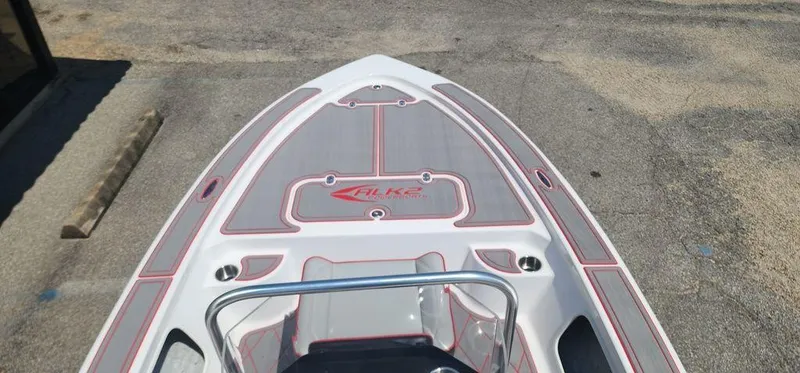 Slide: The Image of 2024 ALK2 Powerboats 17 HS deck, sleek design with red accents. - 27