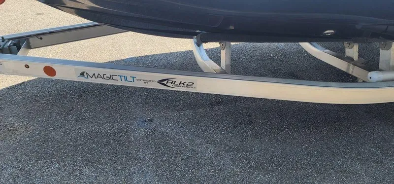 Slide: The Image of 2024 ALK2 Powerboats 17 HS on Magic Tilt trailer, parked on asphalt. - 7