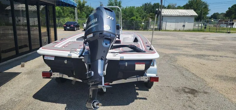 Slide: The Image of 2024 ALK2 Powerboats 17 HS with Yamaha motor, parked outdoors. - 8