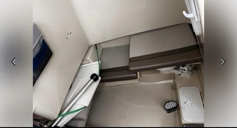 Slide: The Image of 2021 Cutwater C-24W cabin interior with seating and storage. - 9
