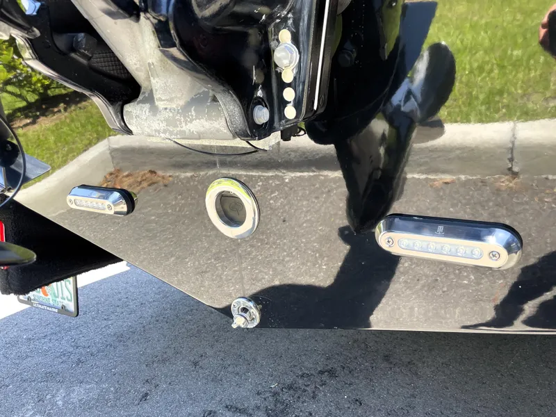 Slide: The Image of 2022 Sea Pro 219 Center Console boat transom with underwater lights and motor mount. - 15