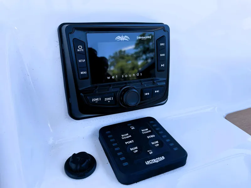 Slide: The Image of 2022 Sea Pro 219 Center Console audio and control panel. - 41