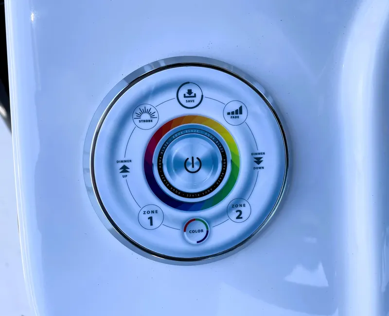 Slide: The Image of 2022 Sea Pro 219 Center Console control panel with color and zone settings. - 45