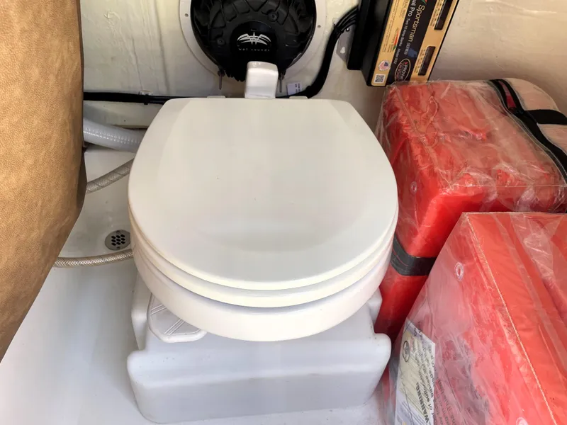Slide: The Image of Portable toilet in 2022 Sea Pro 219 Center Console boat. - 49