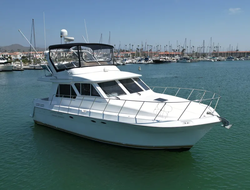 Slide: The Image of 1999 Californian 39 yacht docked in a marina. - 1