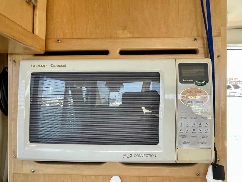 Slide: The Image of Built-in Sharp Carousel microwave in a 1999 Californian 39 yacht kitchen. - 20