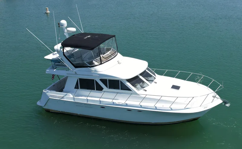 Slide: The Image of 1999 Californian 39 yacht cruising on calm waters. - 4