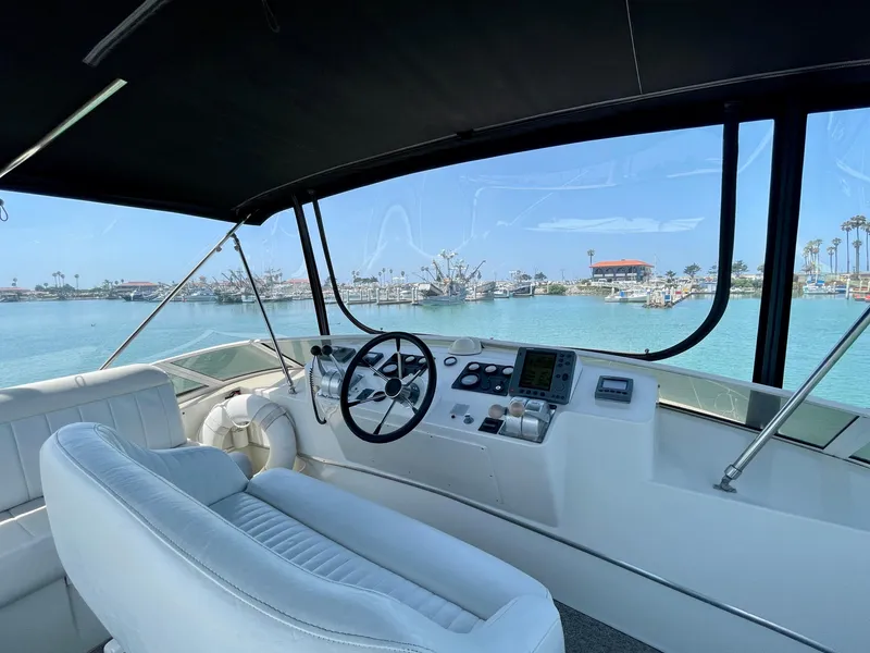 Slide: The Image of 1999 Californian 39 yacht helm with marina view. - 41