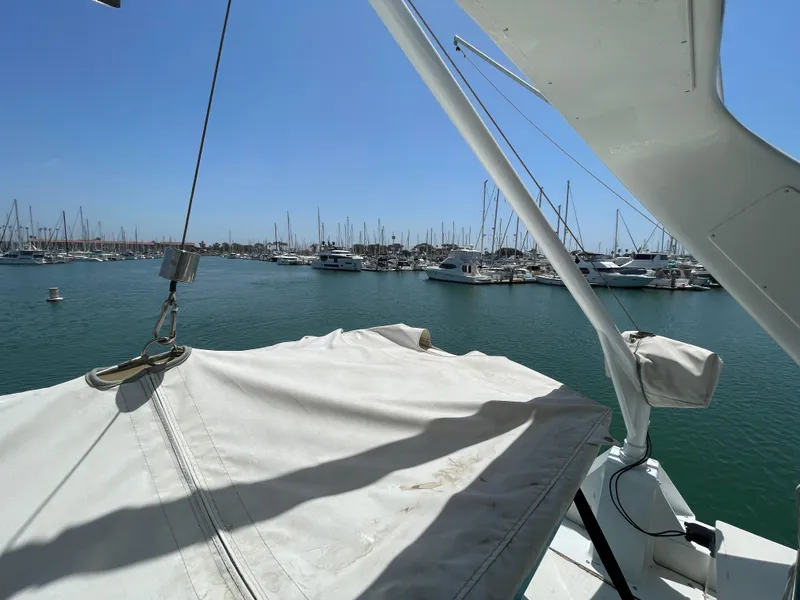Slide: The Image of View from a 1999 Californian 39 yacht overlooking a marina with numerous boats. - 44