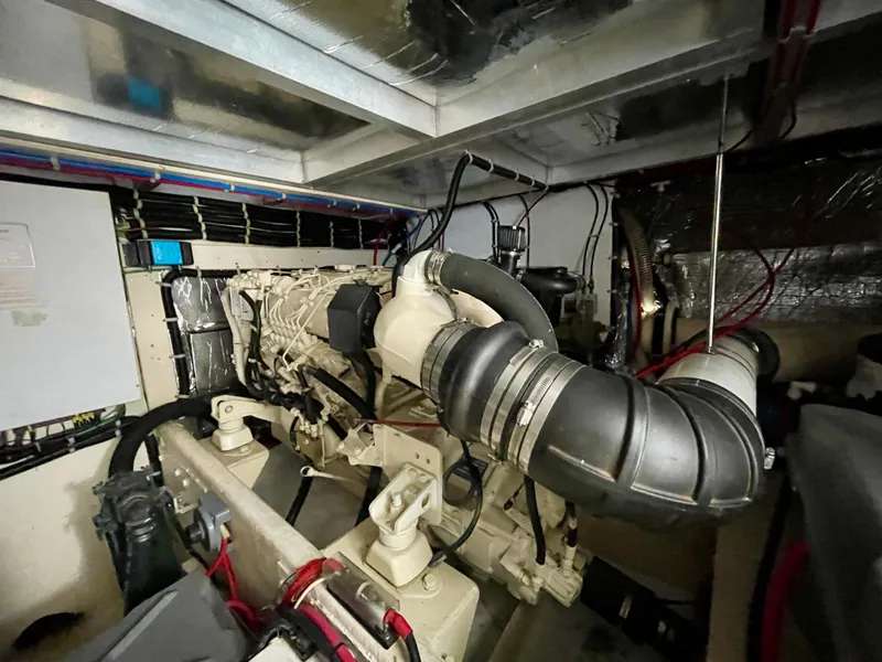 Slide: The Image of Engine room of a 1999 Californian 39 yacht with visible machinery and components. - 6