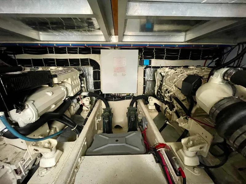 Slide: The Image of Engine room of a 1999 Californian 39 yacht with dual engines. - 7