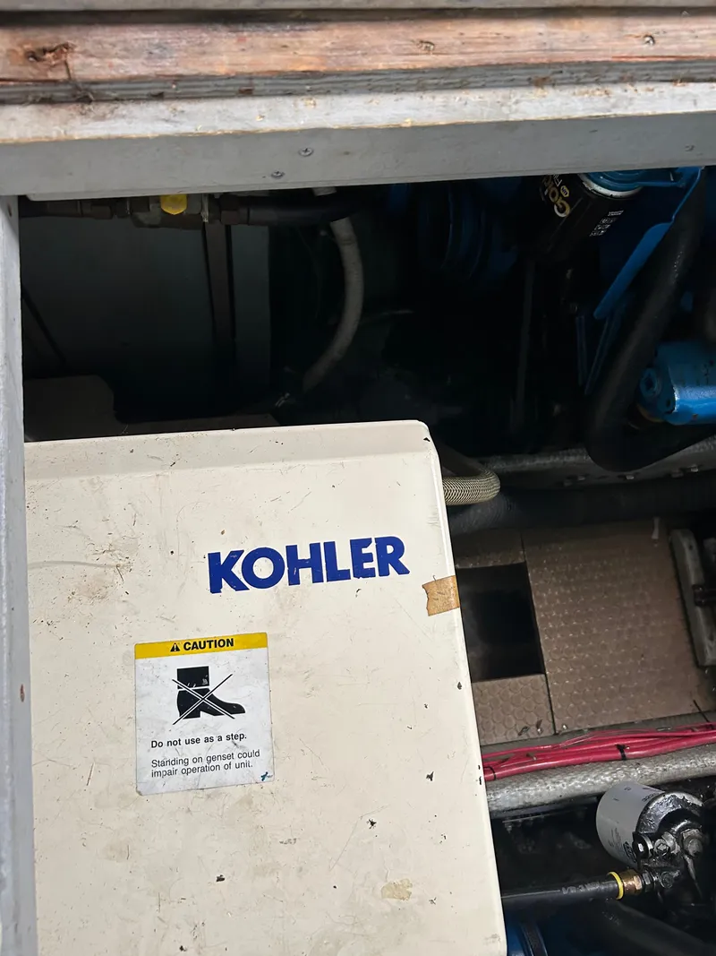 Slide: The Image of Engine compartment of a 1995 Silverton AFT CABIN with Kohler generator. - 20
